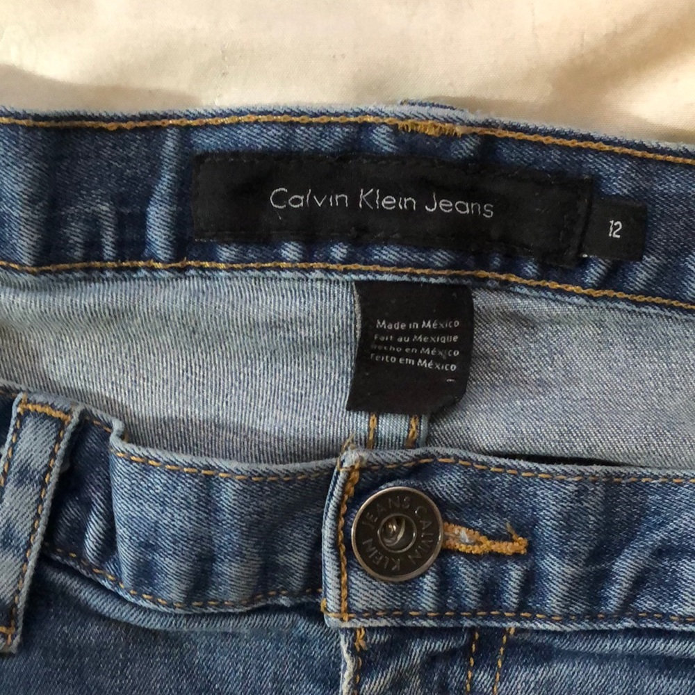 Calvin Klein, mid rise, flair, blue Jean, size 12